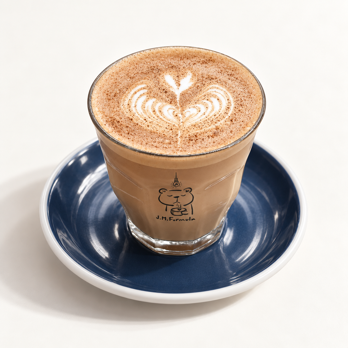 JM Formula Chai Latte on an off-white background