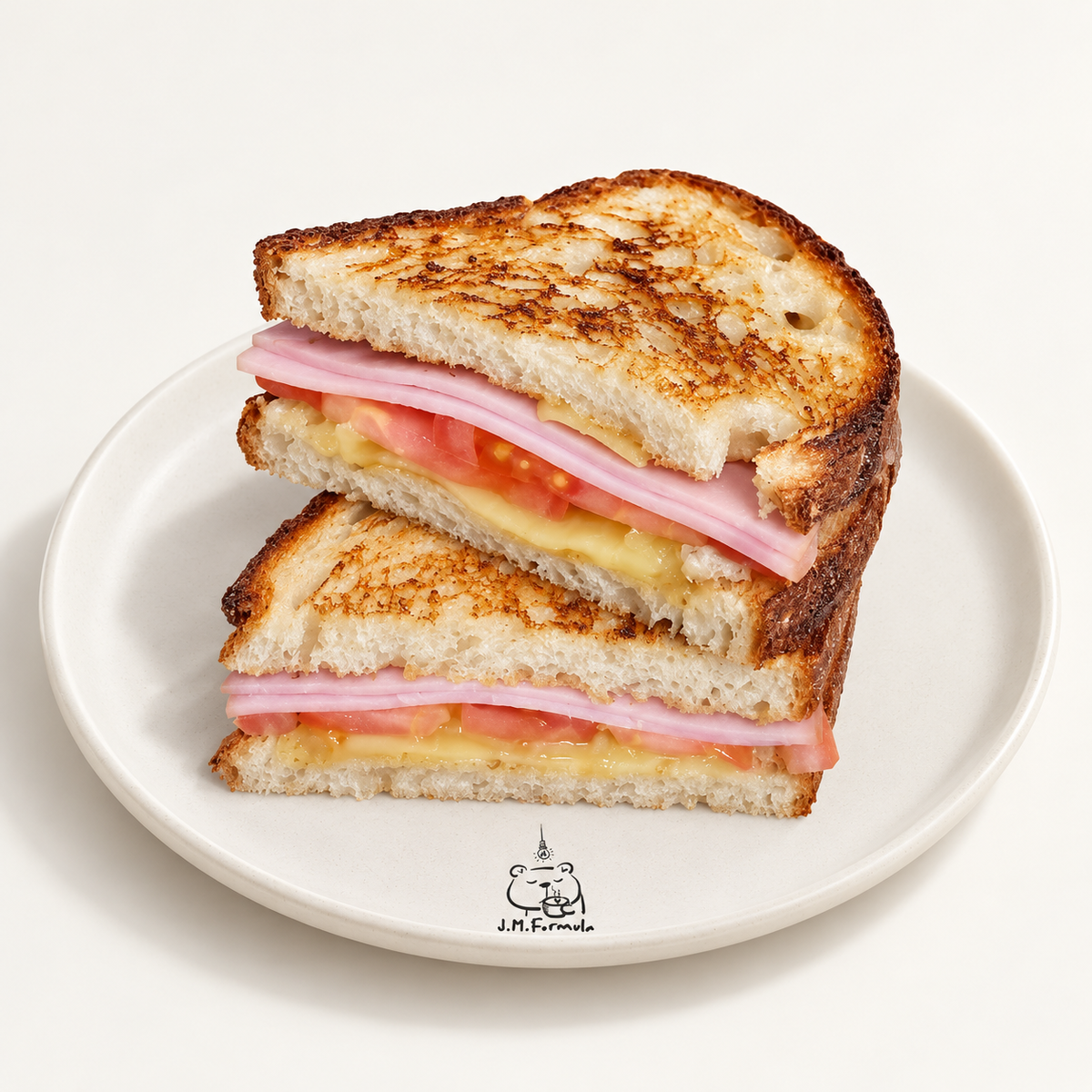 JM Formula Ham, Cheese & Tomato Toastie on an off-white background