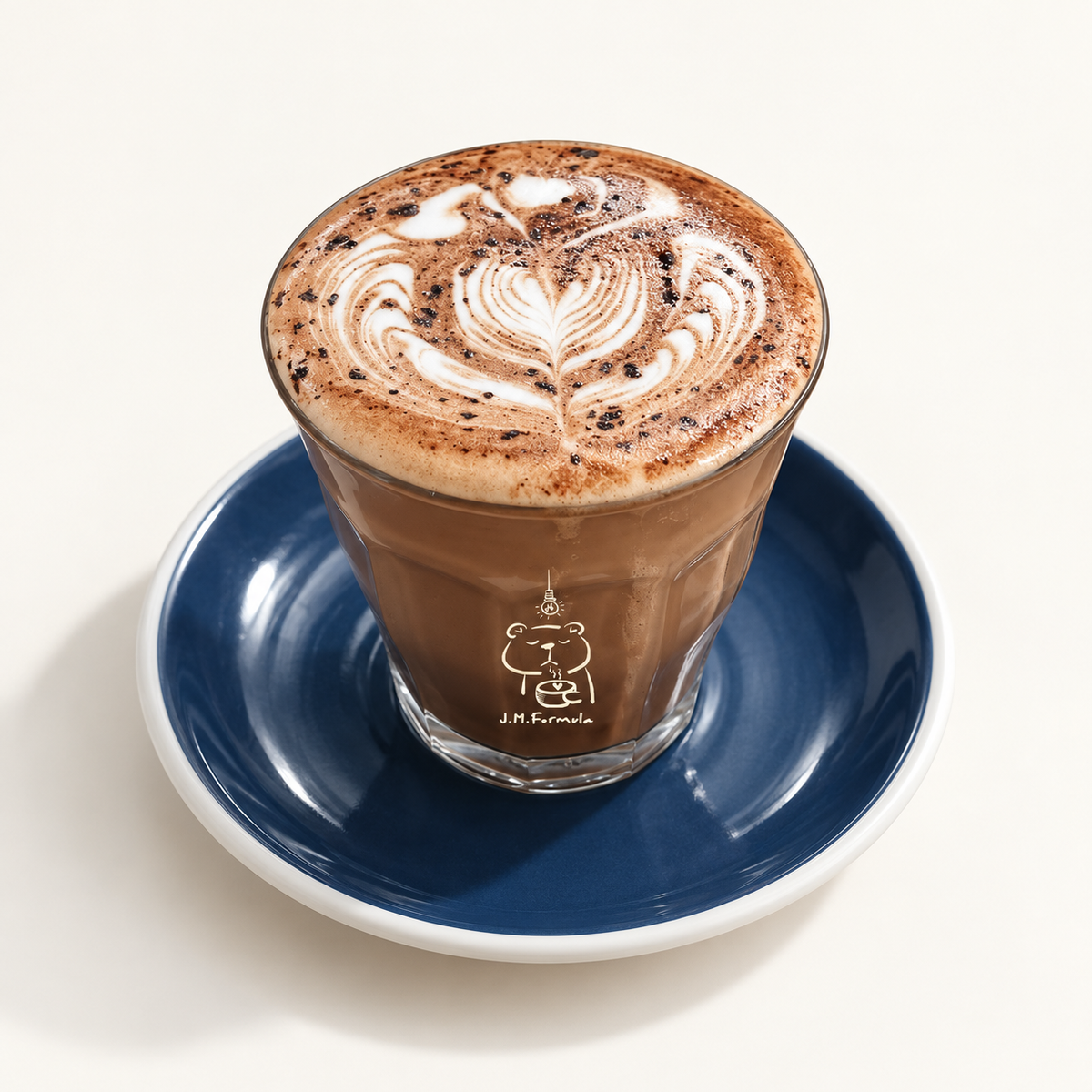 JM Formula Mocha on an off-white background