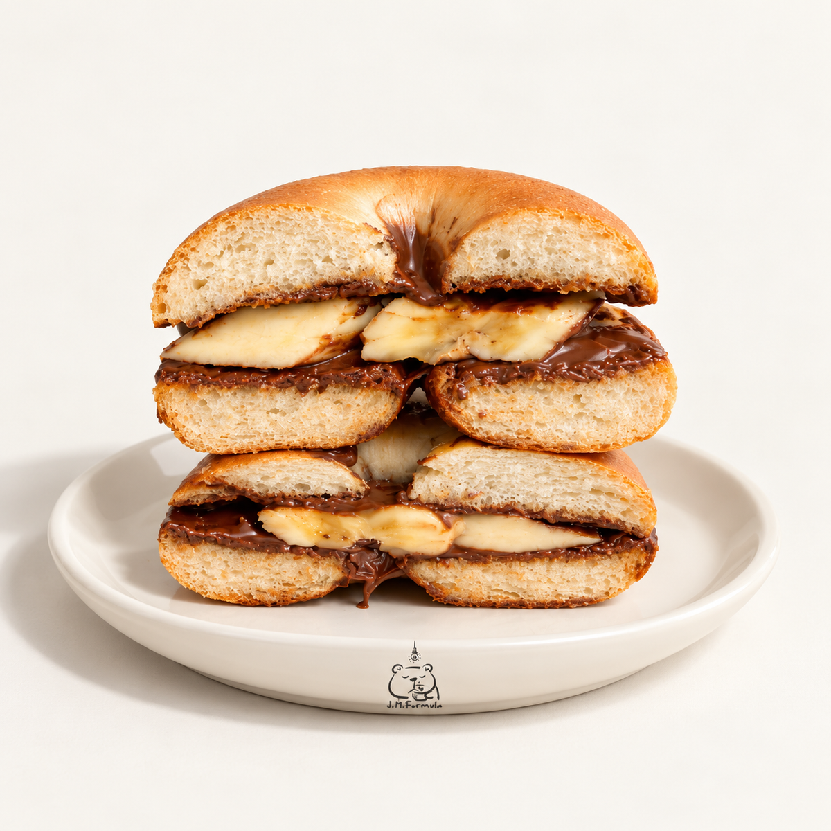 JM Formula Nutella Banana Bagel on an off-white background